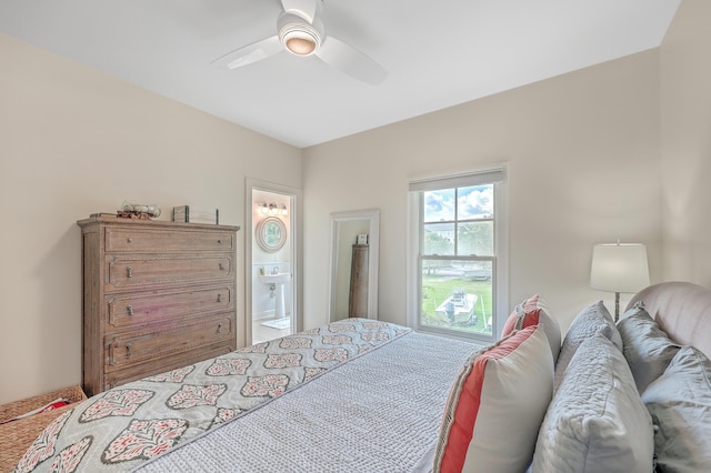 bedroom with ceiling fan and ensuite bathroom