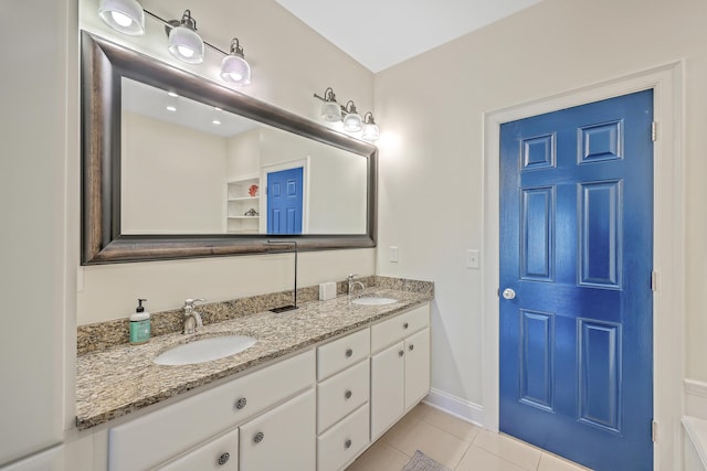 bathroom with vanity and tile patterned floors