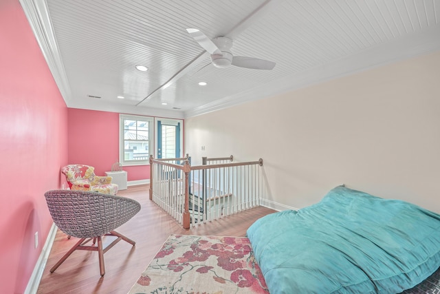 interior space featuring light hardwood / wood-style floors and ornamental molding