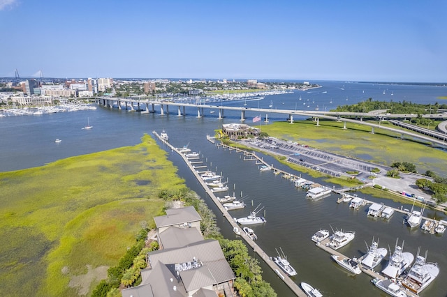 birds eye view of property with a water view