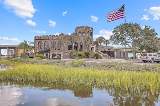 view of building exterior with a water view