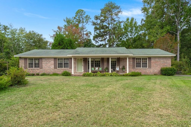 ranch-style home with a front yard