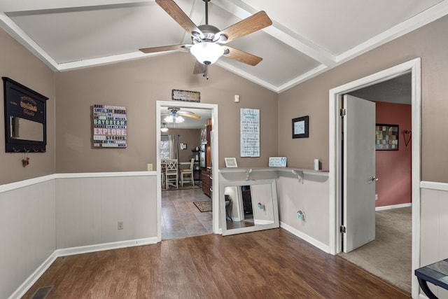 laundry room featuring wood-type flooring and ceiling fan