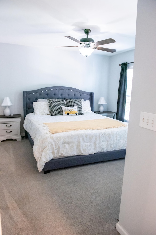 bedroom featuring carpet flooring, ceiling fan, and baseboards