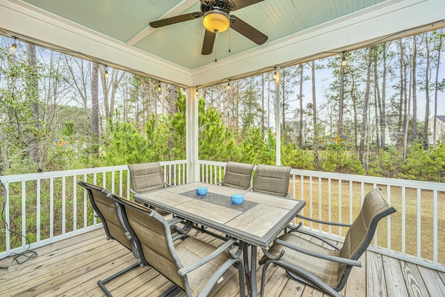 wooden deck featuring ceiling fan