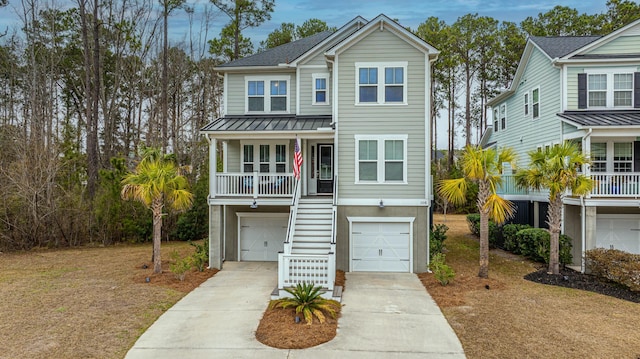 view of front of house featuring a garage and covered porch