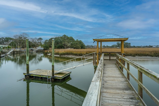 view of dock with a water view and a gazebo