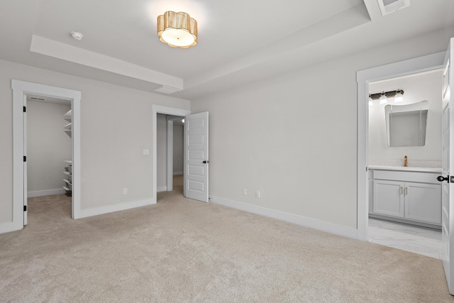 5133 Park Creek Ave, North Charleston, SC 29418 - unfurnished bedroom with a raised ceiling, a spacious closet, light carpet, and ensuite bathroom