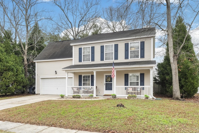 traditional-style home with an attached garage, covered porch, a front lawn, and concrete driveway