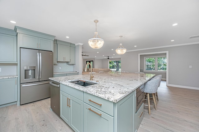 881 Evans Rd, Charleston, SC 29412 - kitchen featuring stainless steel appliances, a sink, recessed lighting, a kitchen island with sink, and light wood-style flooring