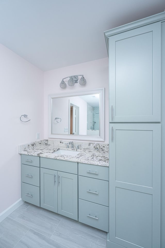 881 Evans Rd, Charleston, SC 29412 - bathroom with vanity, baseboards, and a shower