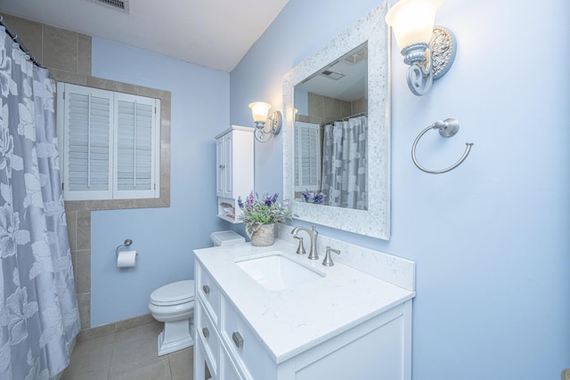 881 Evans Rd, Charleston, SC 29412 - full bath with vanity, toilet, tile patterned floors, and a shower with curtain