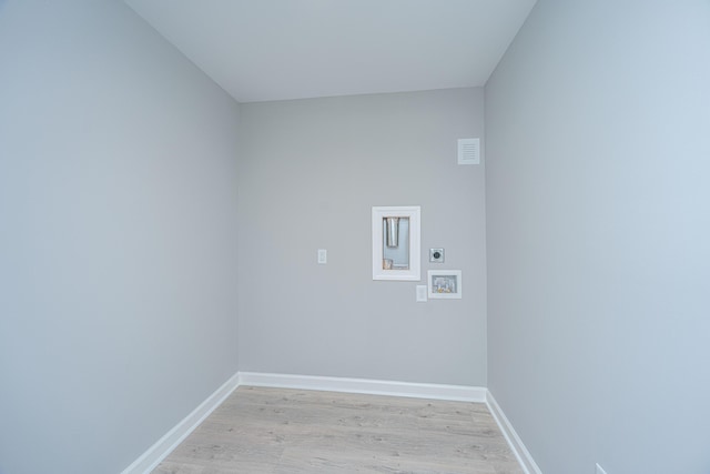 881 Evans Rd, Charleston, SC 29412 - laundry area with hookup for an electric dryer, washer hookup, light wood-style floors, and baseboards