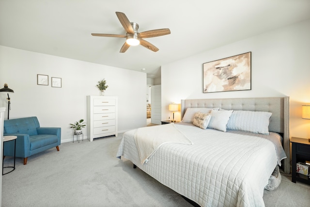 bedroom featuring baseboards, carpet floors, and ceiling fan