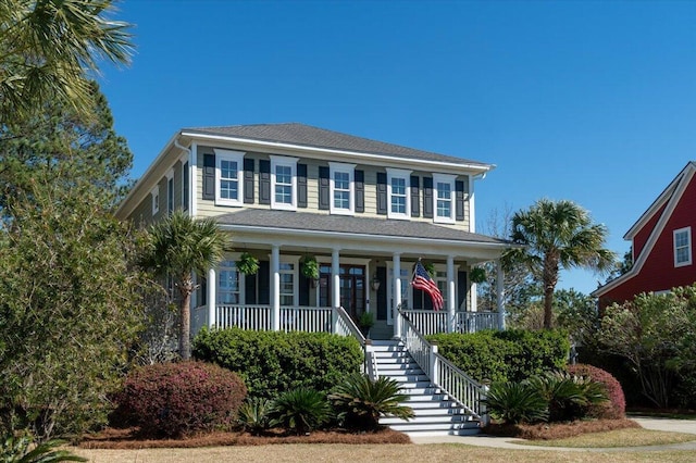 colonial-style house with covered porch and stairway