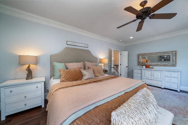 bedroom with ceiling fan, ornamental molding, and wood finished floors