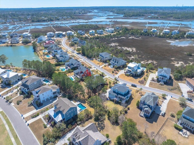 aerial view featuring a water view and a residential view