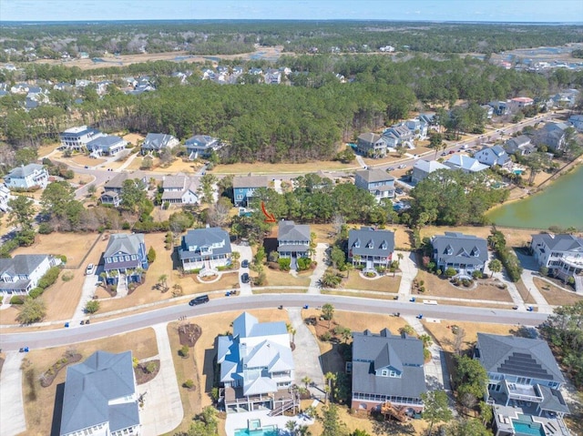 aerial view with a residential view and a water view