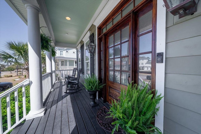 wooden deck featuring covered porch