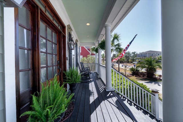 wooden terrace with covered porch