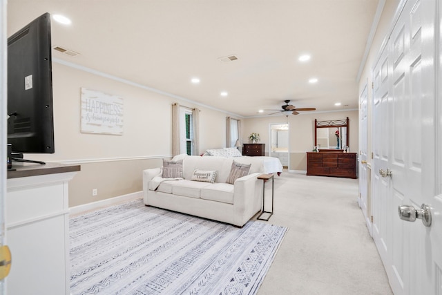 living area with recessed lighting, a ceiling fan, light carpet, baseboards, and crown molding