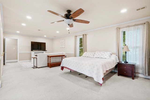 bedroom featuring crown molding, light carpet, recessed lighting, baseboards, and a ceiling fan
