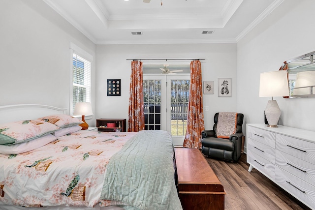3529 Habenaria Rd Unit 33, Mount Pleasant, SC 29466 - bedroom with a tray ceiling, wood finished floors, access to exterior, and ornamental molding