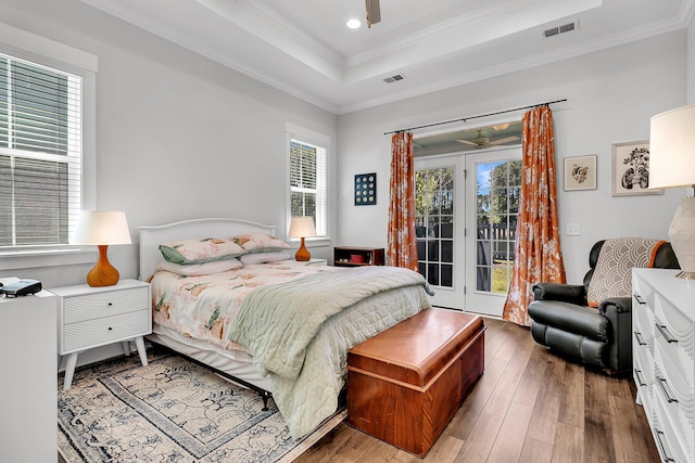 3529 Habenaria Rd Unit 33, Mount Pleasant, SC 29466 - bedroom with access to exterior, hardwood / wood-style flooring, a raised ceiling, crown molding, and ceiling fan