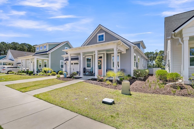 3529 Habenaria Rd Unit 33, Mount Pleasant, SC 29466 - view of front of house with a porch and a front yard