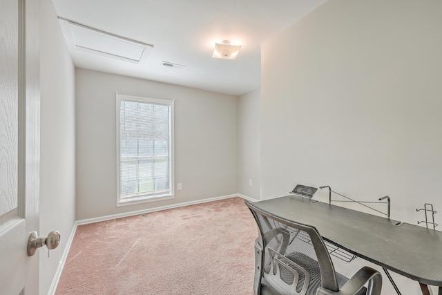 carpeted home office with visible vents, attic access, and baseboards