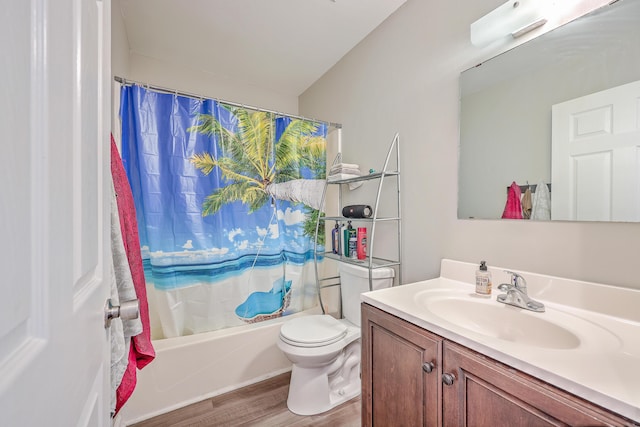 bathroom with toilet, vanity, shower / bath combo with shower curtain, and wood finished floors