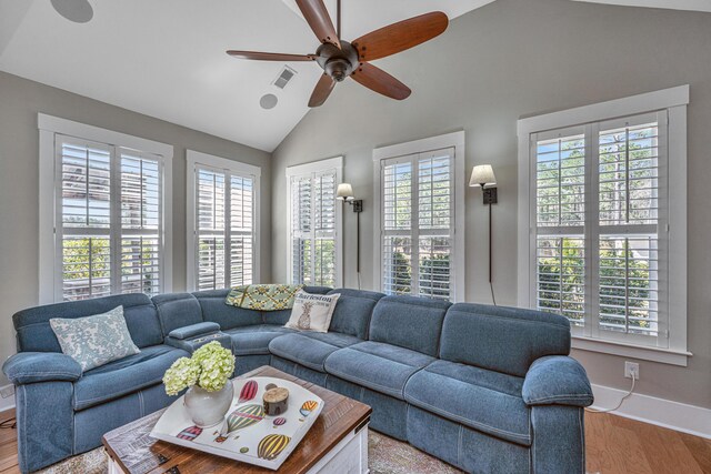 225 Camber Rd, Huger, SC 29450 - living area with light wood-style flooring, a ceiling fan, lofted ceiling, and baseboards