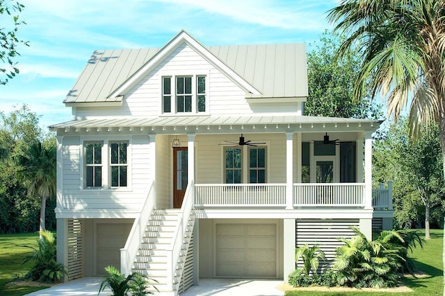 5005 Saltspray Ln, Johns Island, SC 29455 - coastal inspired home with stairway, ceiling fan, a garage, and a standing seam roof