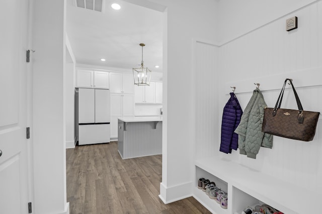 1238 Homecoming Blvd, Ravenel, SC 29470 - mudroom with wood finished floors, a notable chandelier, visible vents, baseboards, and recessed lighting