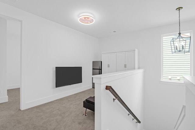 1238 Homecoming Blvd, Ravenel, SC 29470 - stairway featuring carpet, baseboards, and an inviting chandelier