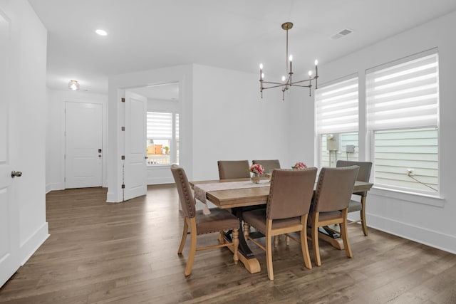 1238 Homecoming Blvd, Ravenel, SC 29470 - dining area featuring an inviting chandelier, wood finished floors, visible vents, baseboards, and recessed lighting
