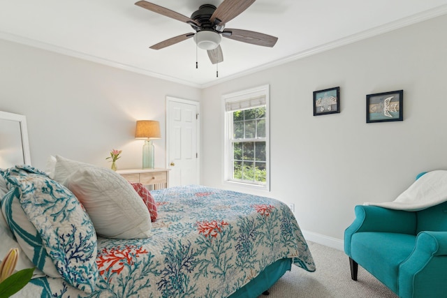 carpeted bedroom with crown molding and ceiling fan