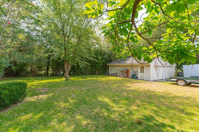 view of yard with a garage