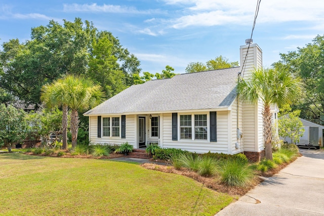 ranch-style house with a front yard