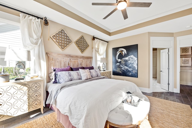 bedroom with hardwood / wood-style flooring and ceiling fan