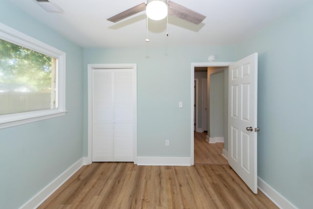 4836 Hillock Ave, North Charleston, SC 29418 - unfurnished bedroom with light wood-style flooring, a closet, and ceiling fan