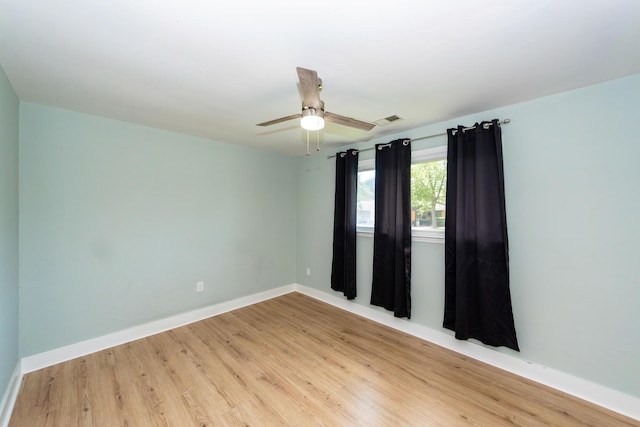 4836 Hillock Ave, North Charleston, SC 29418 - empty room with light wood finished floors and ceiling fan