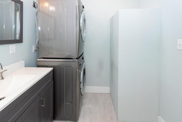 4836 Hillock Ave, North Charleston, SC 29418 - washroom featuring stacked washer and clothes dryer and a sink