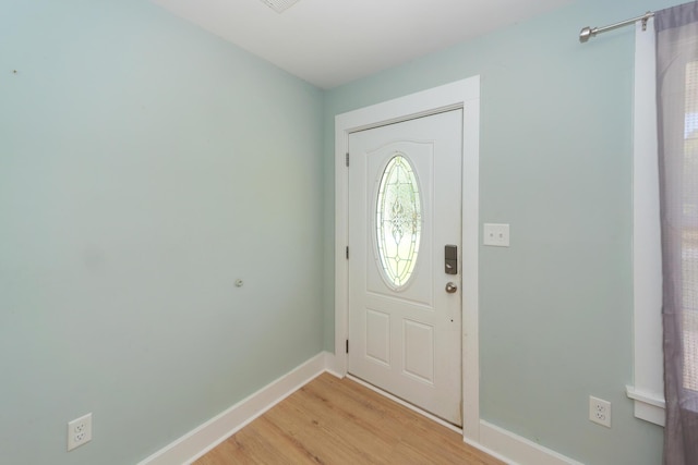 4836 Hillock Ave, North Charleston, SC 29418 - foyer entrance with light wood-type flooring and baseboards