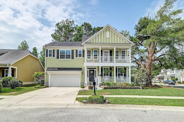 neoclassical / greek revival house with a porch, concrete driveway, an attached garage, a front yard, and a shingled roof