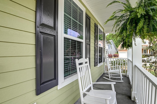 balcony featuring a porch