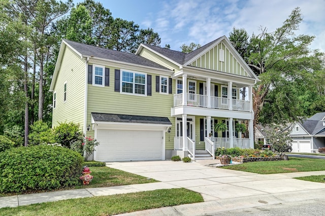 view of front facade with a porch, concrete driveway, a balcony, an attached garage, and a shingled roof