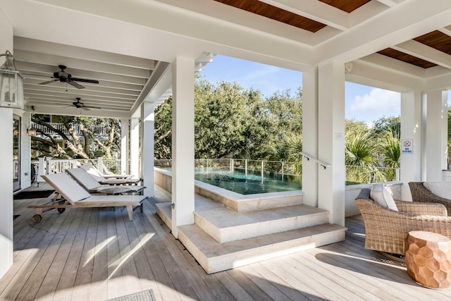 4001 Palm Blvd, Isle Of Palms, SC 29451 - wooden terrace with a ceiling fan