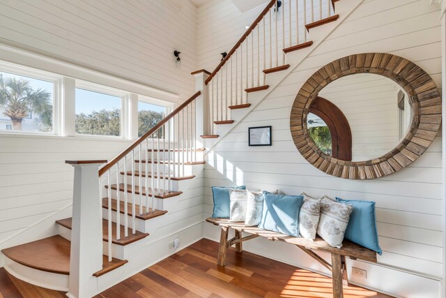 4001 Palm Blvd, Isle Of Palms, SC 29451 - stairway featuring wooden walls and wood finished floors
