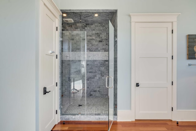 4001 Palm Blvd, Isle Of Palms, SC 29451 - bathroom with a stall shower and wood finished floors